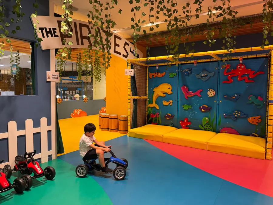Pirates' Cove with pedal karts and a painted reef wall
