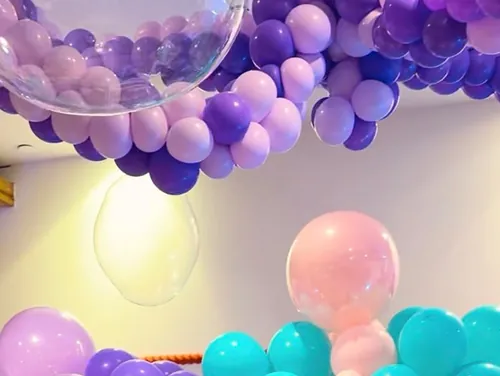 Balloon arches over the cake table &mdash; Royal Birthday at Treasure Island Dubai